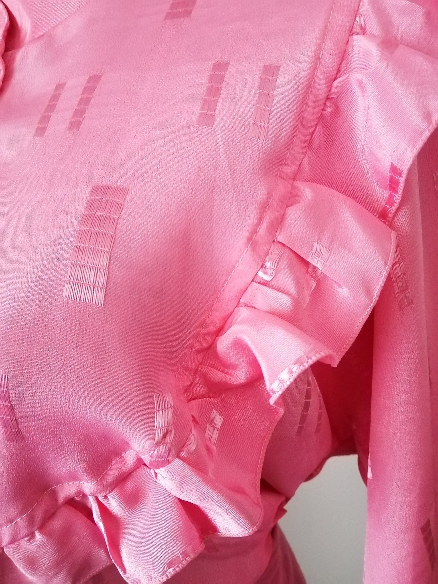 Bright pink frill blouse